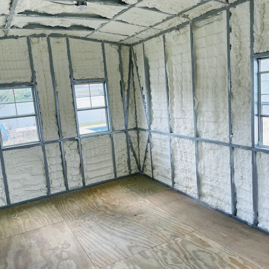 Closed-cell spray foam insulation applied to wall cavities in a residential project in Opelousas